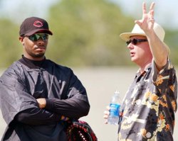 Jim Bowden weaving his fist-bumping magic on Ken Griffey, Jr.