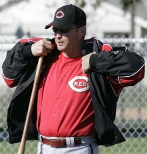 Reds manager Jerry Narron looks remarkably reminiscent of previous manager Dave Miley while donning a Reds jacket. Hopefully Narron will draw the line before removing massage chairs and taking down jerseys.