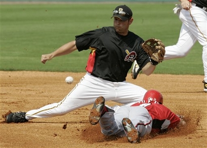 Freel is out trying to steal second (AP Photo/Al Behrman)