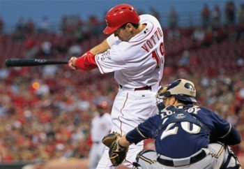 Joey Votto hits the double that brings in the Reds' only run (AP Photo/Al Behrman)