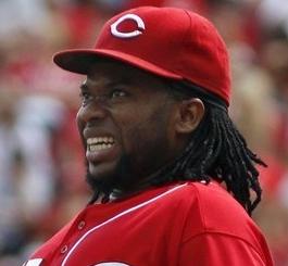 Johnny Cueto reacts to having a 3-run homer hit off him. That doesn't happen very often. (AP Photo/Tom Uhlman)