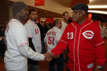 Reds great Lee May greets newest Reds reliever Arthur Rhodes. Credit: The Cincinnati Reds