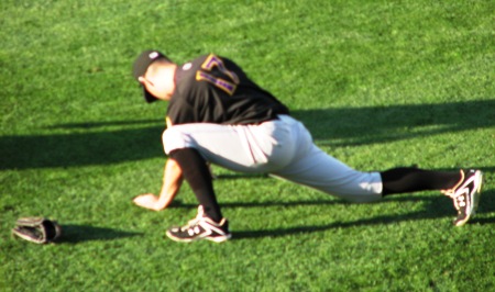 Cozart stretching before the game