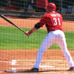 Gomes holds his bat out while waiting for a pitch Gomes holds his bat out while waiting for a pitch