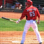 Mesoraco standing with his bat outstretched