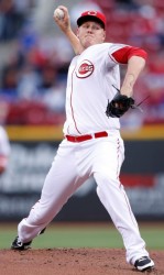 Latos pitches during his first win as a Red