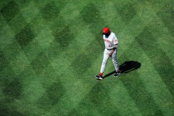 Dusty Baker walks across the outfield