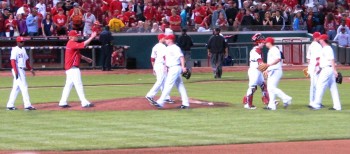 The Reds high five each other after a win.