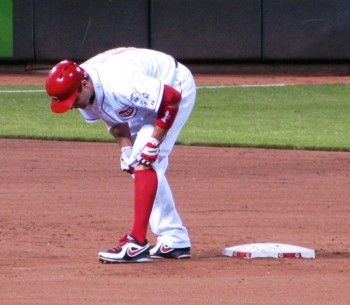 Once on second, Joey Votto put on a knee brace.