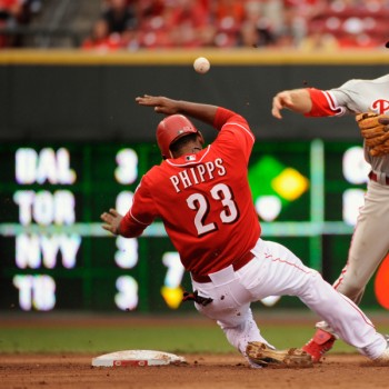 Denis Phipps tries to break up a double play.  (Photo by Jamie Sabau/Getty Images)