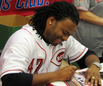 Johnny Cueto signing in the kids section of RedsFest.