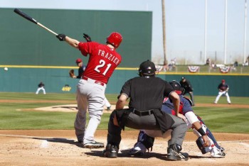 Todd Frazier singles in the first inning, knocking in Joey Votto.