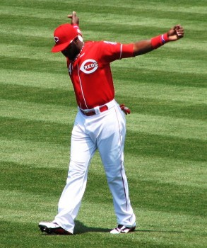 Phillips loosens his arms before the game