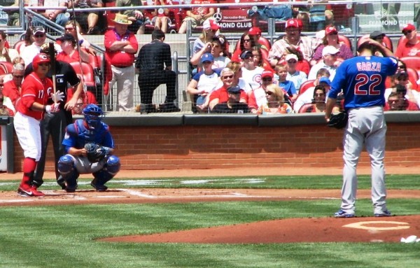 Garza throws the first pitch of the game