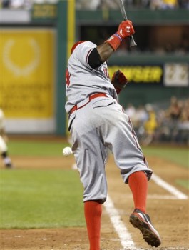 Brandon Phillips is probably in some pain in this picture, but I still admire the high socks. (AP Photo/Keith Srakocic)