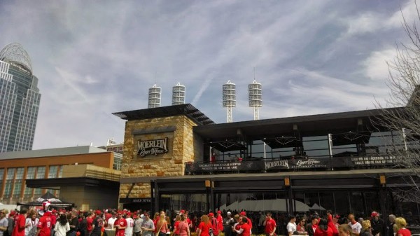 The Great American Ball Park light stacks appear above the Moerlein Lager House.