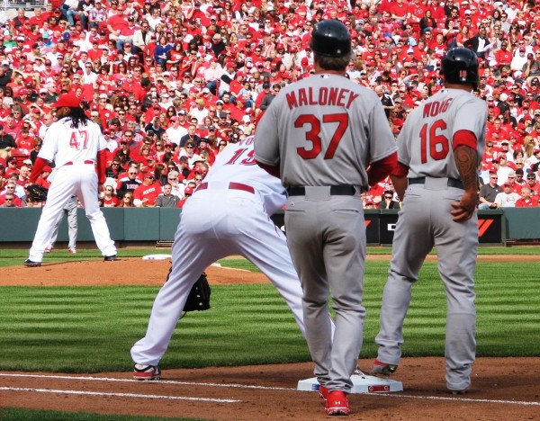 Votto holds on Wong at first.