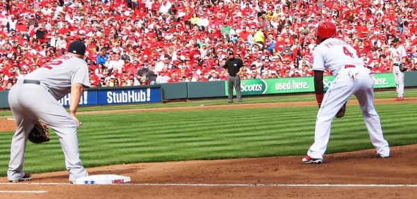 Phillips leads off from first base.