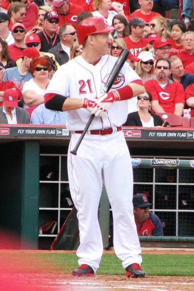 Frazier adjusts his batting gloves.