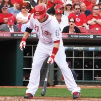 Frazier taps the plate with his bat.