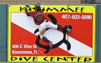 Reggie Abercrombie climbs the wall