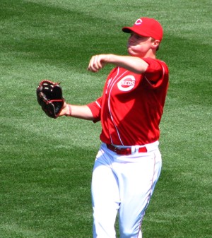 Jay Bruce warming up with the right field ball boy
