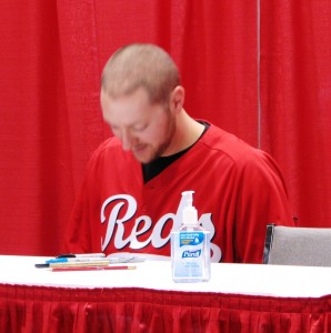 Maloney does his signing under the table.