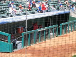 Reds trickle into the dugout before the game